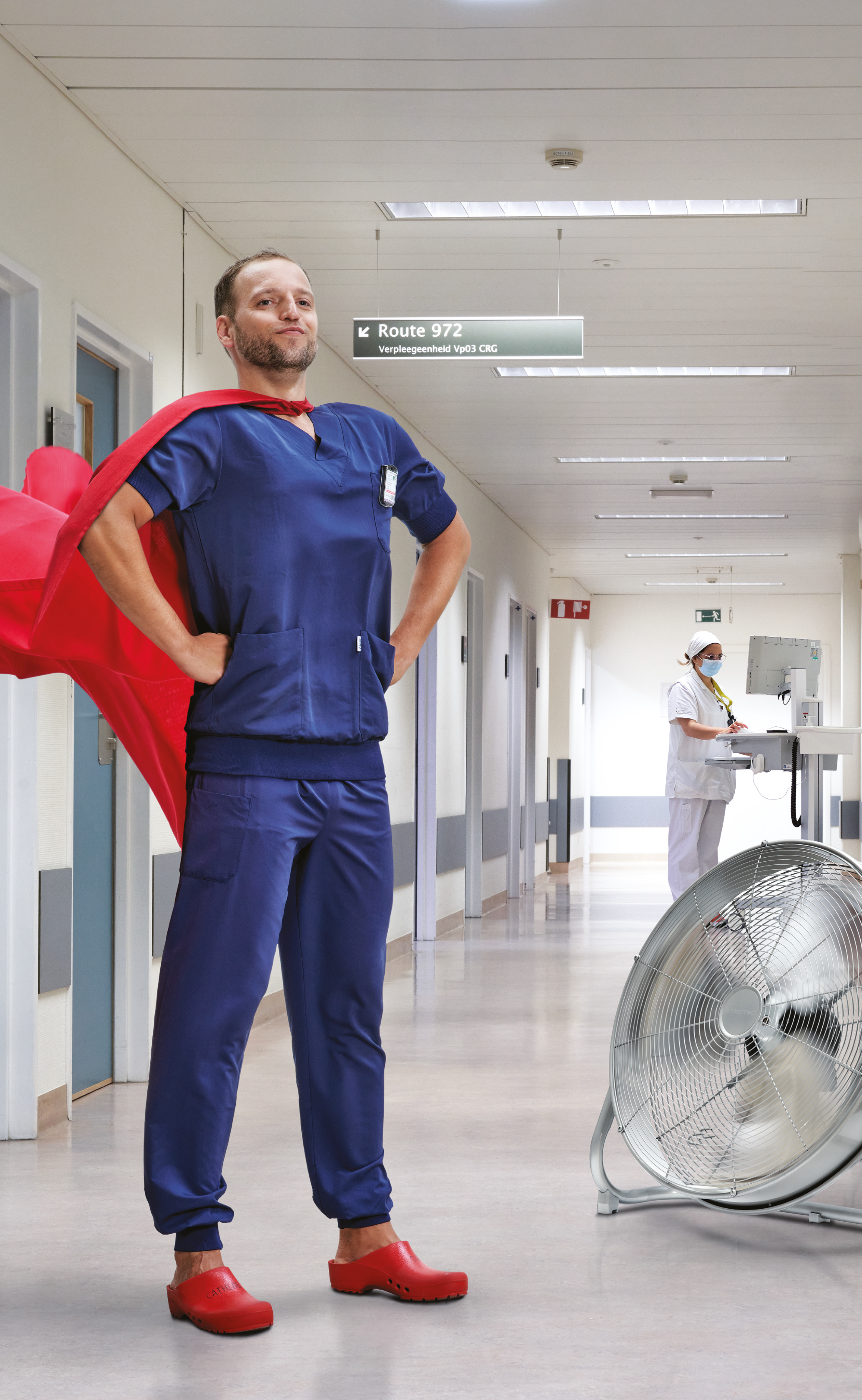 Black and white photo of a women performing modern dance on a dark background.